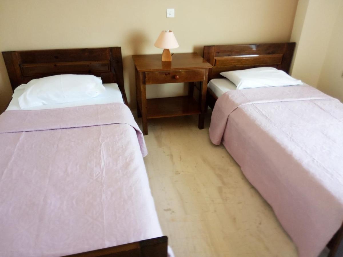 Faros Apartments Артемида Екстериор снимка
